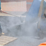 While,Laying,Asphalt,Road,Worker,Repair,Asphalt,Covering,New,Road